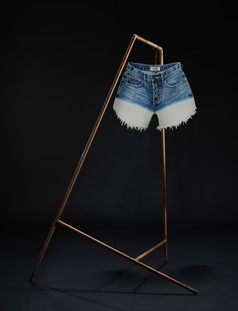 Front view of the B O R O デニム (BORO DENIM) 'Nagoya Let it Bleed' denim shorts displayed on a rack with a black background. These shorts feature a 2-tone bleached ombre effect on premium Japanese Selvedge Fabric, washed for a distinctive vintage character